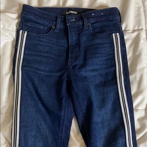 Express blue skinny jeans with varsity stripe